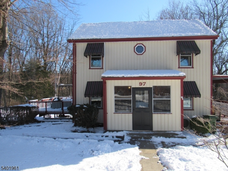 97 Hickory Corner Road Milford, NJ 08848 - Photo 1 of 14 a front view of a house with parking