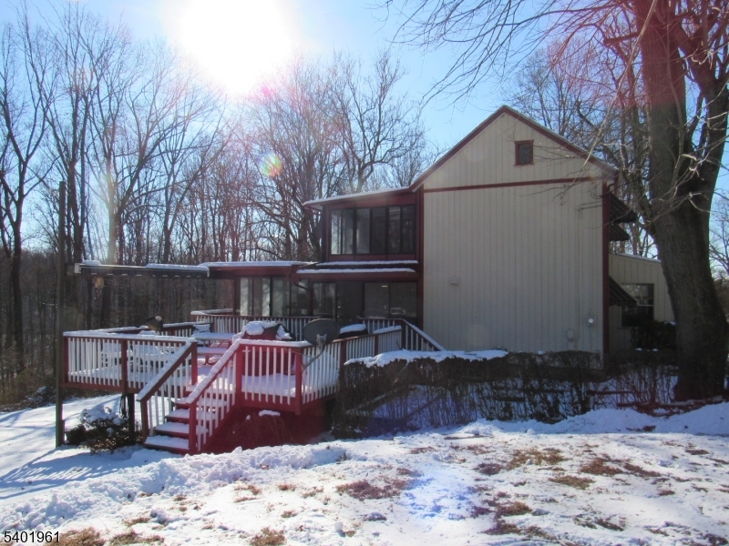 97 Hickory Corner Road Milford, NJ 08848 - Photo 2 of 14 a view of backyard with wooden fence and trees