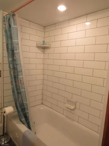 a bathroom with a toilet and a sink