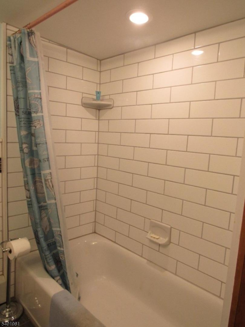 97 Hickory Corner Road Milford, NJ 08848 - Photo 8 of 14 a bathroom with a shower