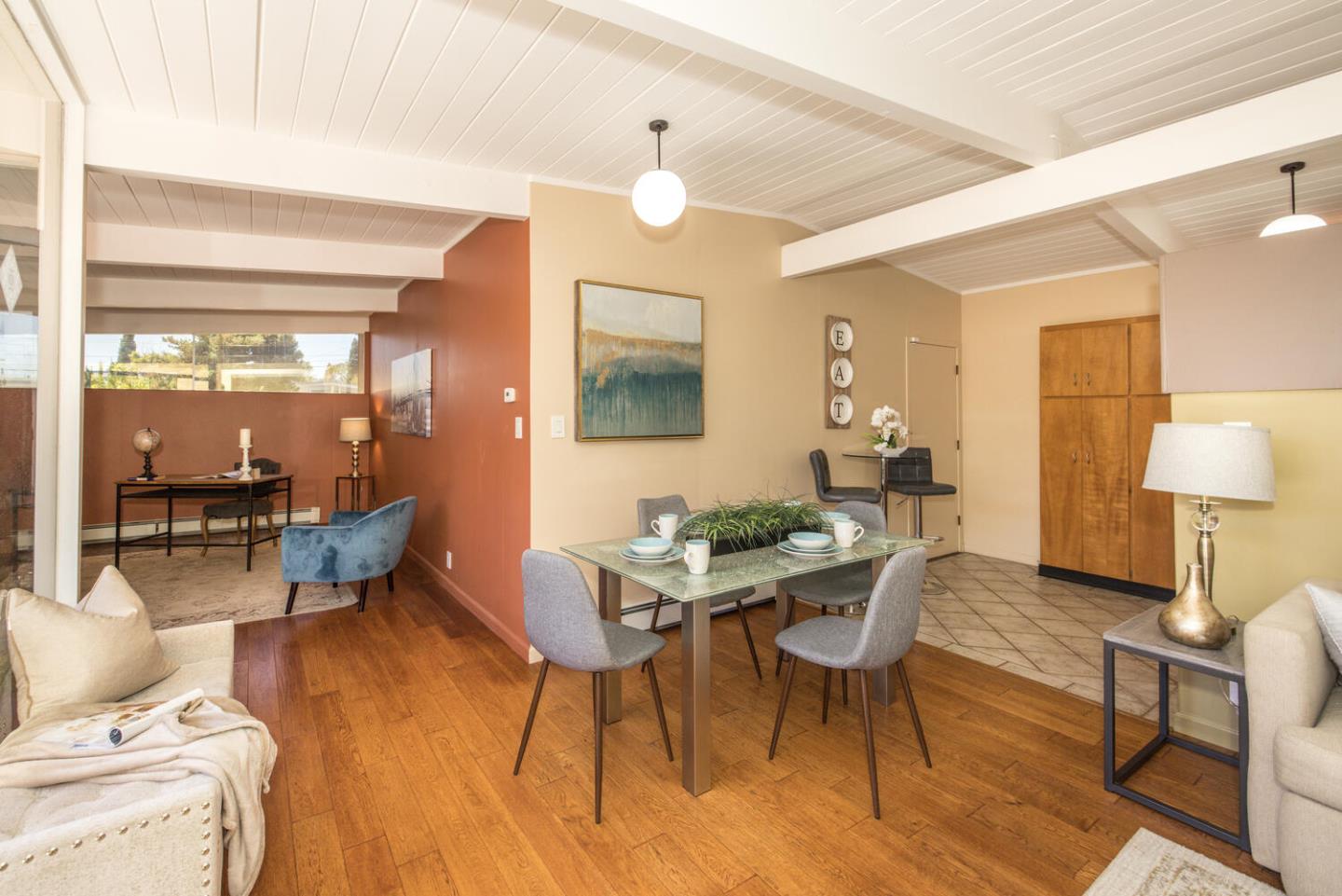 1619 Celeste Drive San Mateo, CA 94402 - Photo 13 of 44 a living room with furniture and a wooden floor