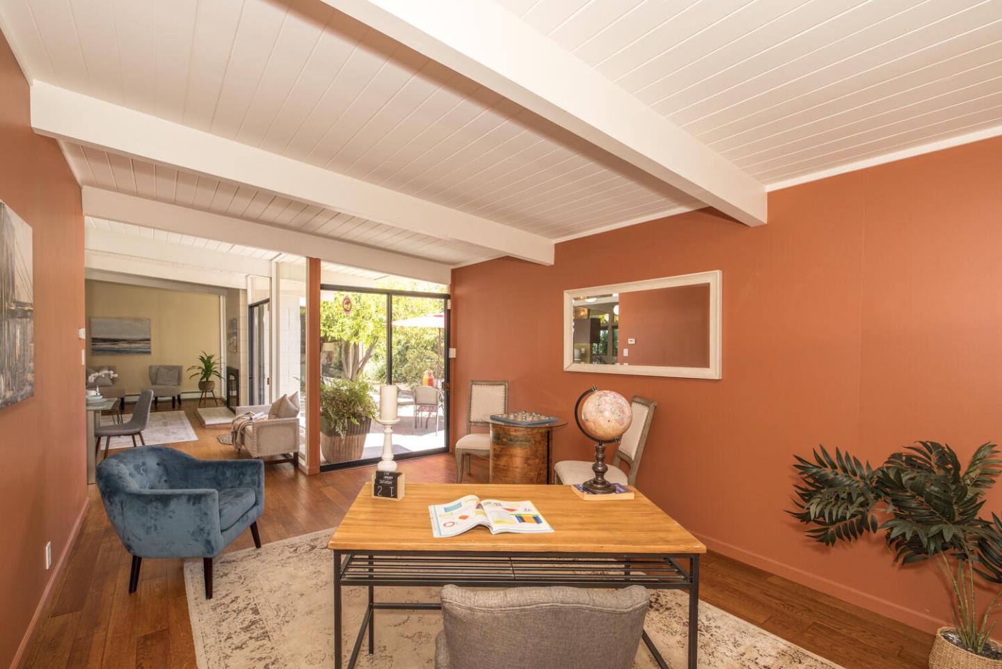 1619 Celeste Drive San Mateo, CA 94402 - Photo 16 of 44 a view of a dining room with furniture and a large window