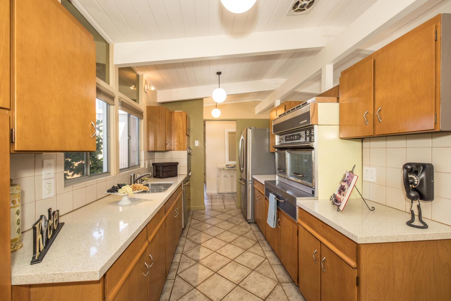 1619 Celeste Drive San Mateo, CA 94402 - Photo 17 of 44 a large kitchen with a large window