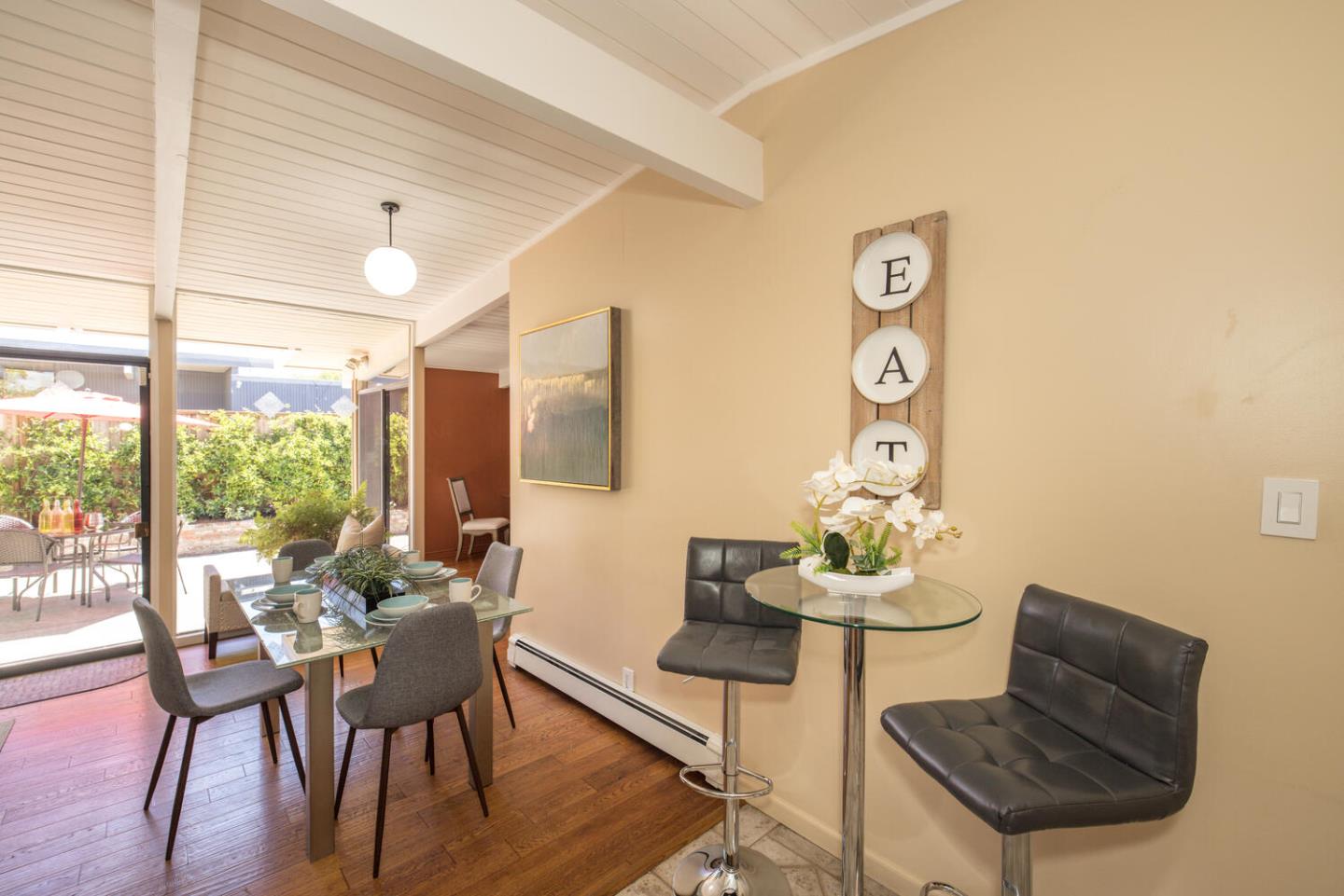 1619 Celeste Drive San Mateo, CA 94402 - Photo 21 of 44 a dining room with furniture and window