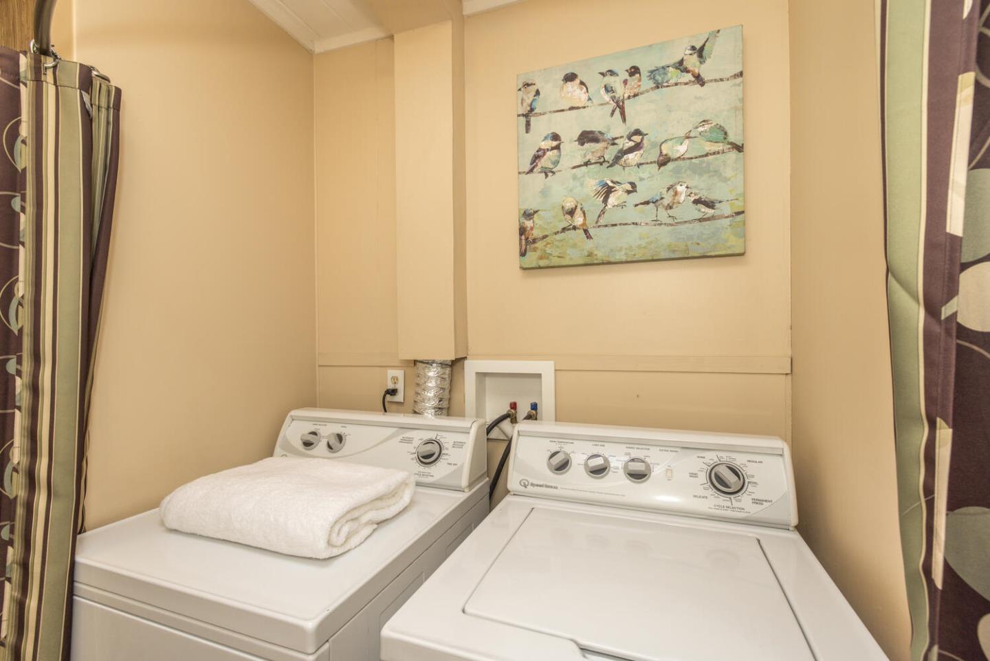 1619 Celeste Drive San Mateo, CA 94402 - Photo 33 of 44 a room with a bed and a white cabinet