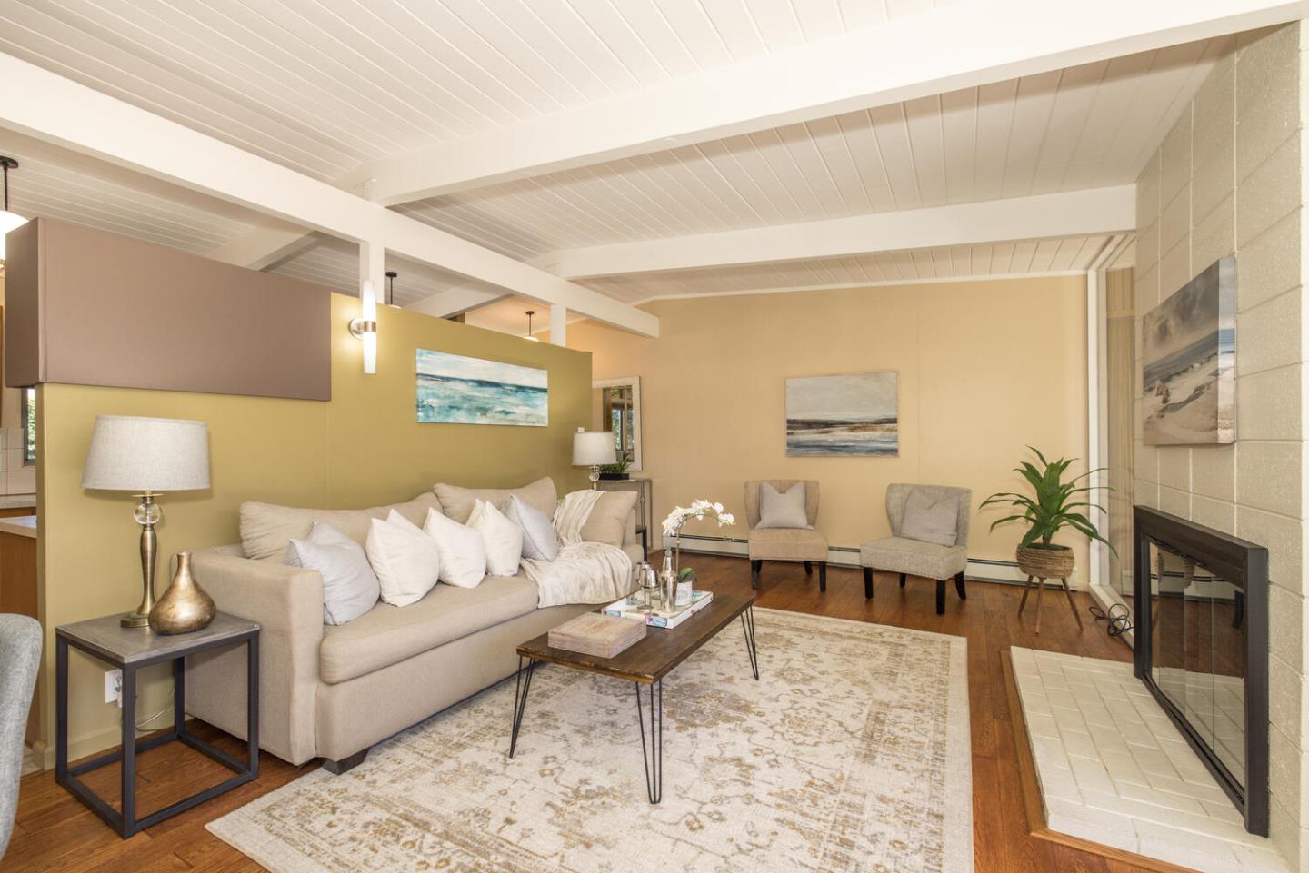 1619 Celeste Drive San Mateo, CA 94402 - Photo 9 of 44 a living room with furniture and a lamp