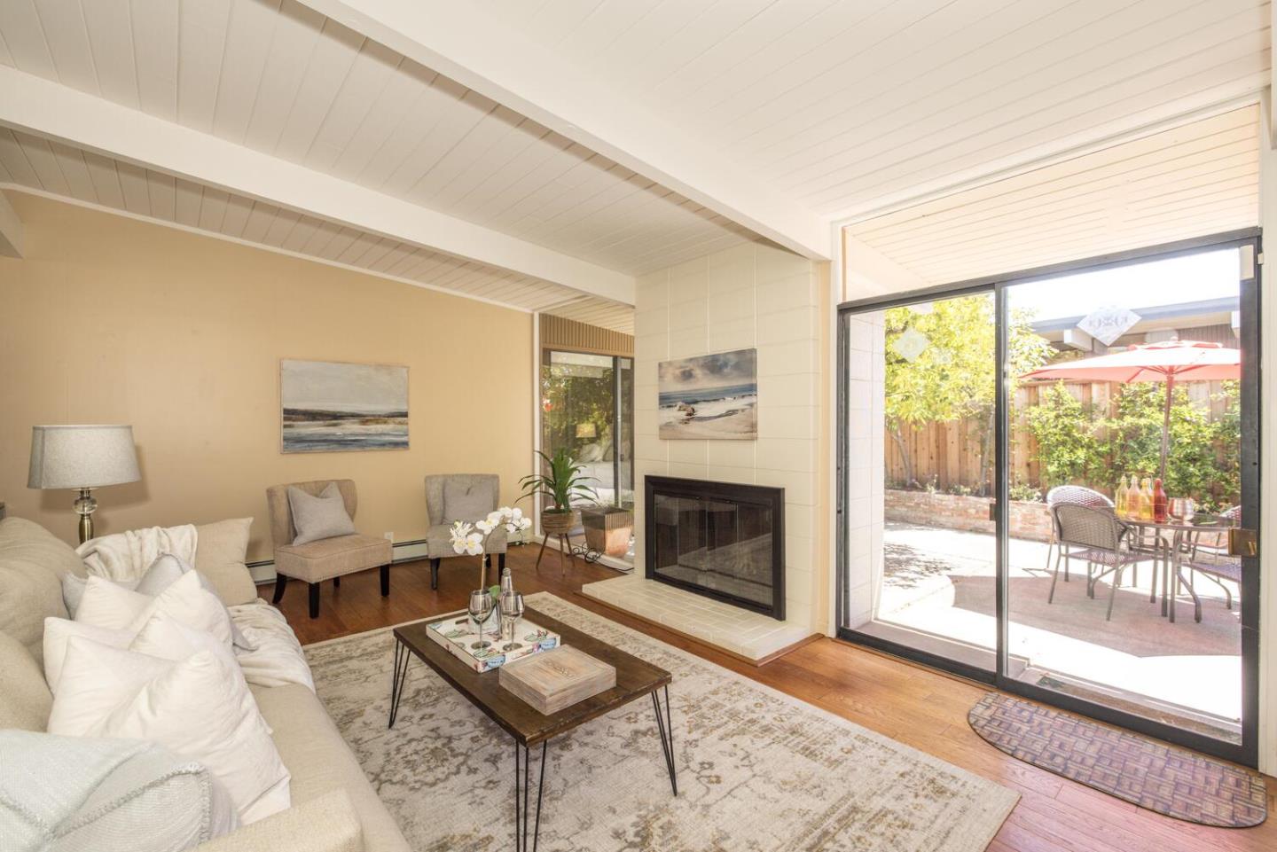 1619 Celeste Drive San Mateo, CA 94402 - Photo 10 of 44 a bedroom with furniture and a fireplace