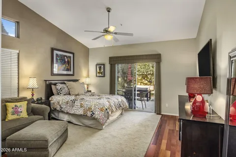 a bedroom with a bed and furniture