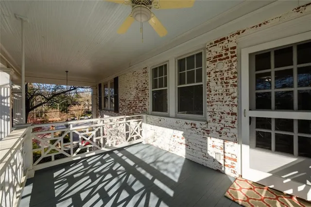 a view of a balcony with chairs