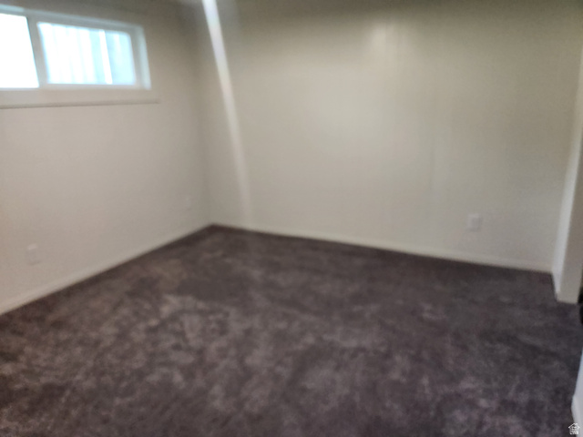 705 North 700 East Payson, UT 84651 - Photo 25 of 30 Basement with dark colored carpet and baseboards