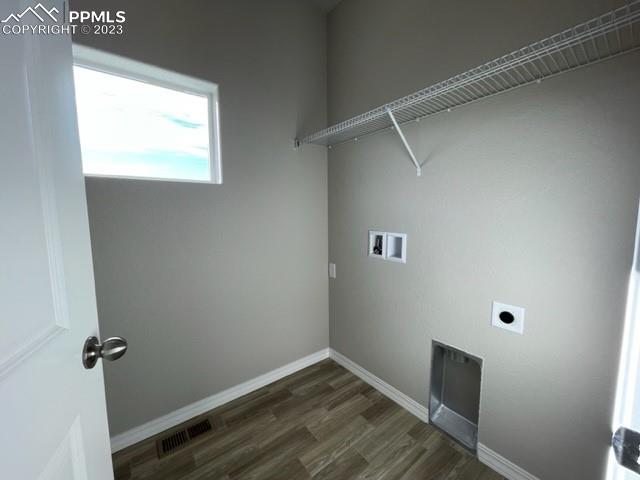 2931 Magic Carpet Loop Colorado Springs, CO 80916 - Photo 10 of 13 a view of a room with wooden floor and a window