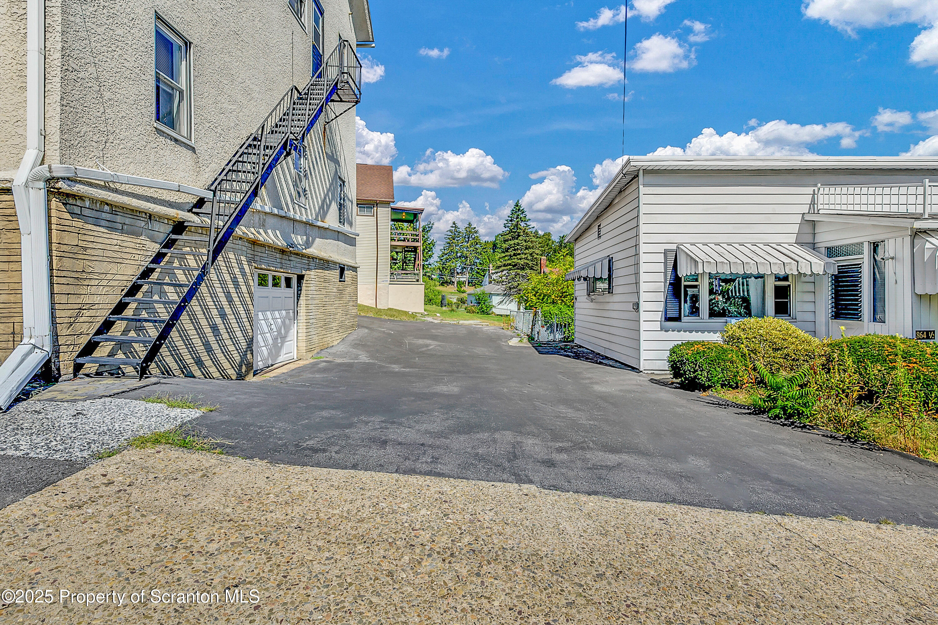 864 South Main Street, Unit 2 Old Forge, PA 18518 - Photo 13 of 14 a view of a house with a street