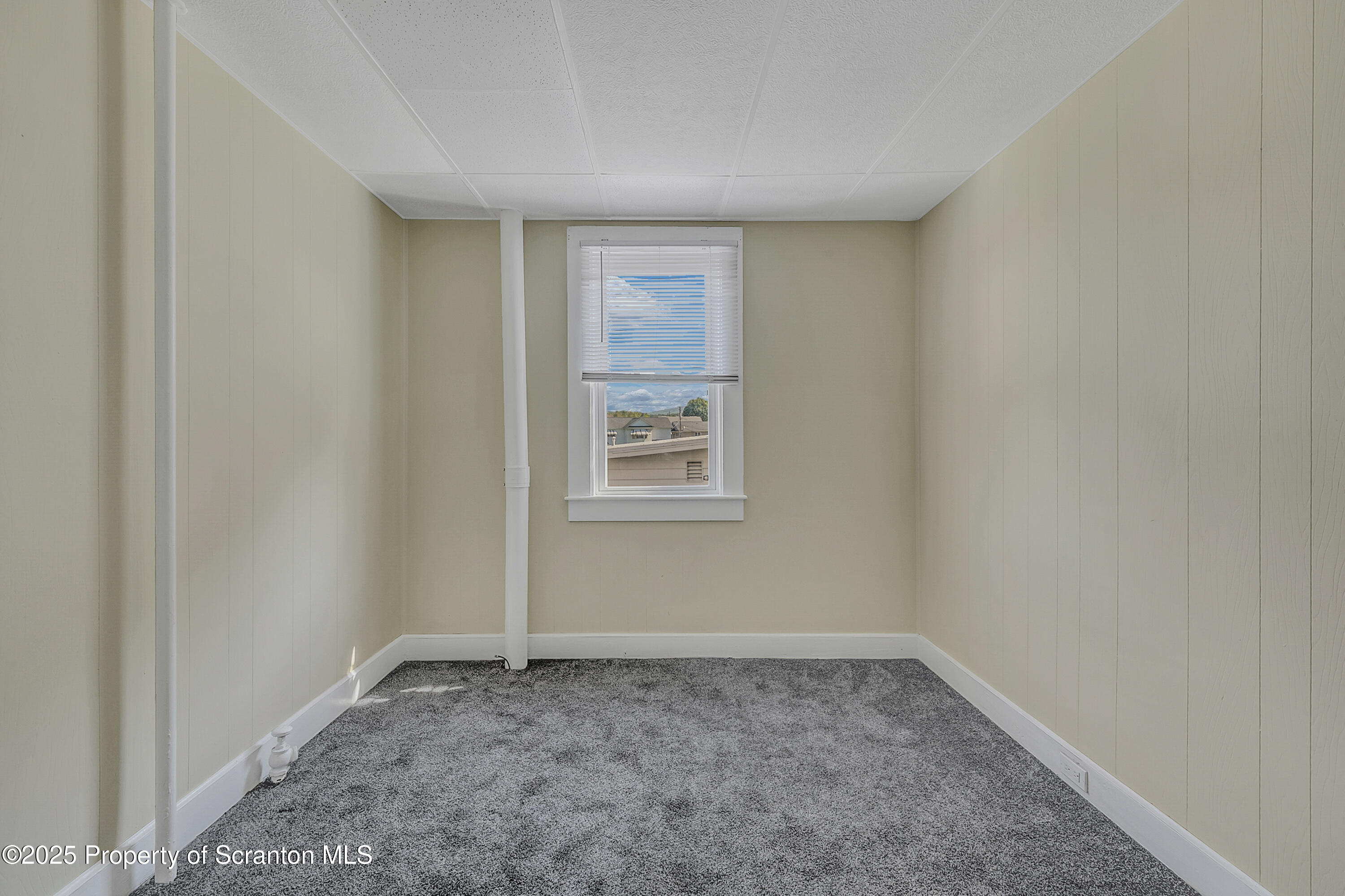 864 South Main Street, Unit 2 Old Forge, PA 18518 - Photo 6 of 14 a view of an empty room with a window