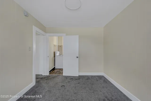 a bathroom with a tub and a sink