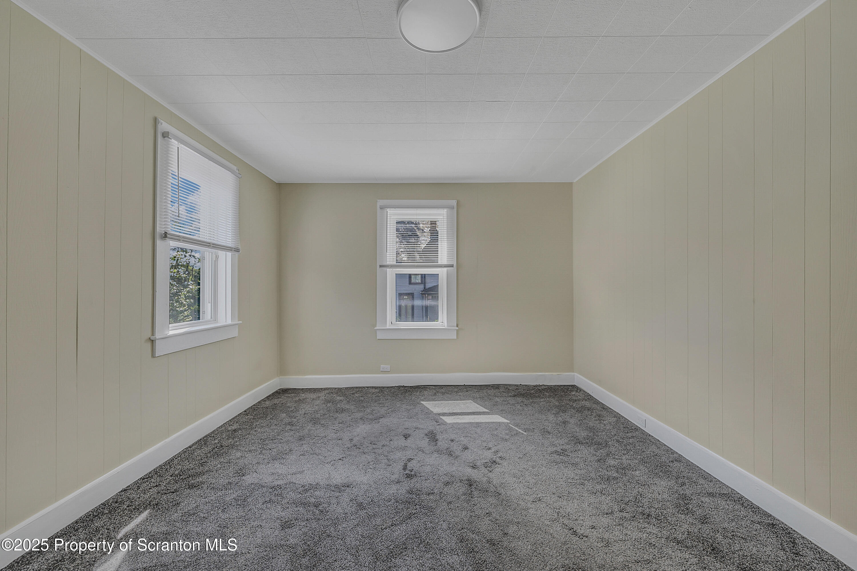 864 South Main Street, Unit 2 Old Forge, PA 18518 - Photo 9 of 14 a view of an empty room with a window