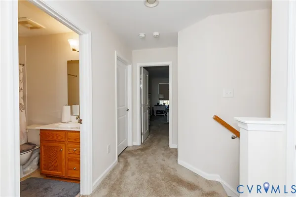 a view of a livingroom with wooden floor and closet