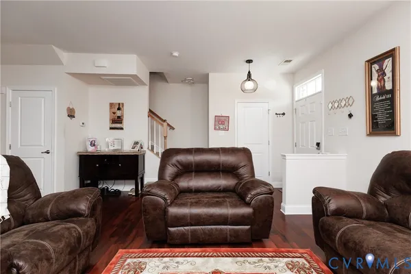 a living room with furniture and a couch
