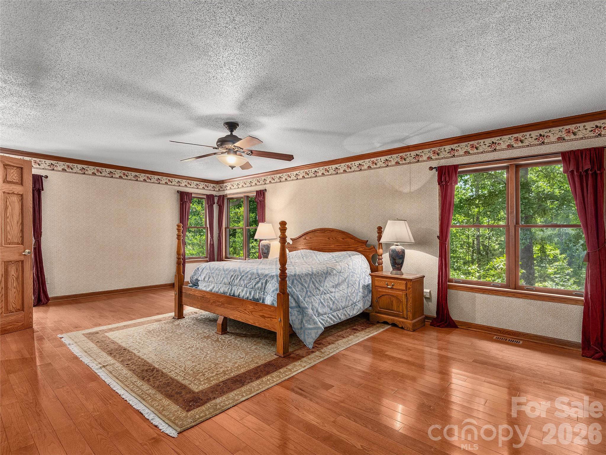 40 Deer Ridge Road Mills River, NC 28759 - Photo 20 of 35 a bed room with a bed and a window