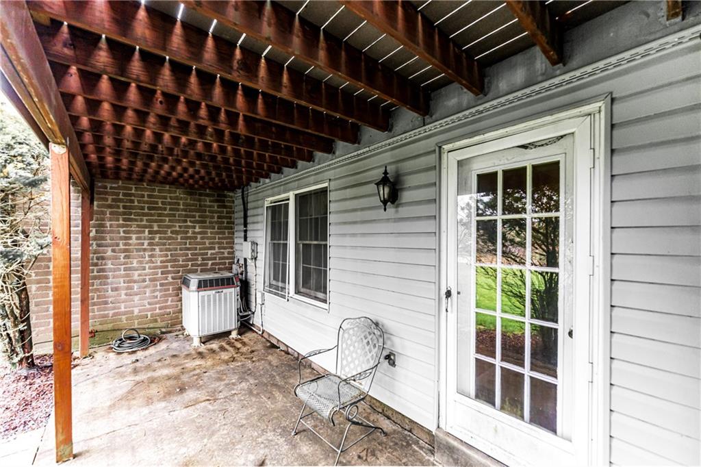 199 Roscommon Place Canonsburg, PA 15317 - Photo 26 of 32 a view of a porch with a table and chairs