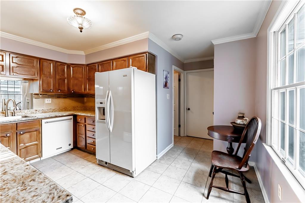 199 Roscommon Place Canonsburg, PA 15317 - Photo 6 of 32 a kitchen with a refrigerator and a sink