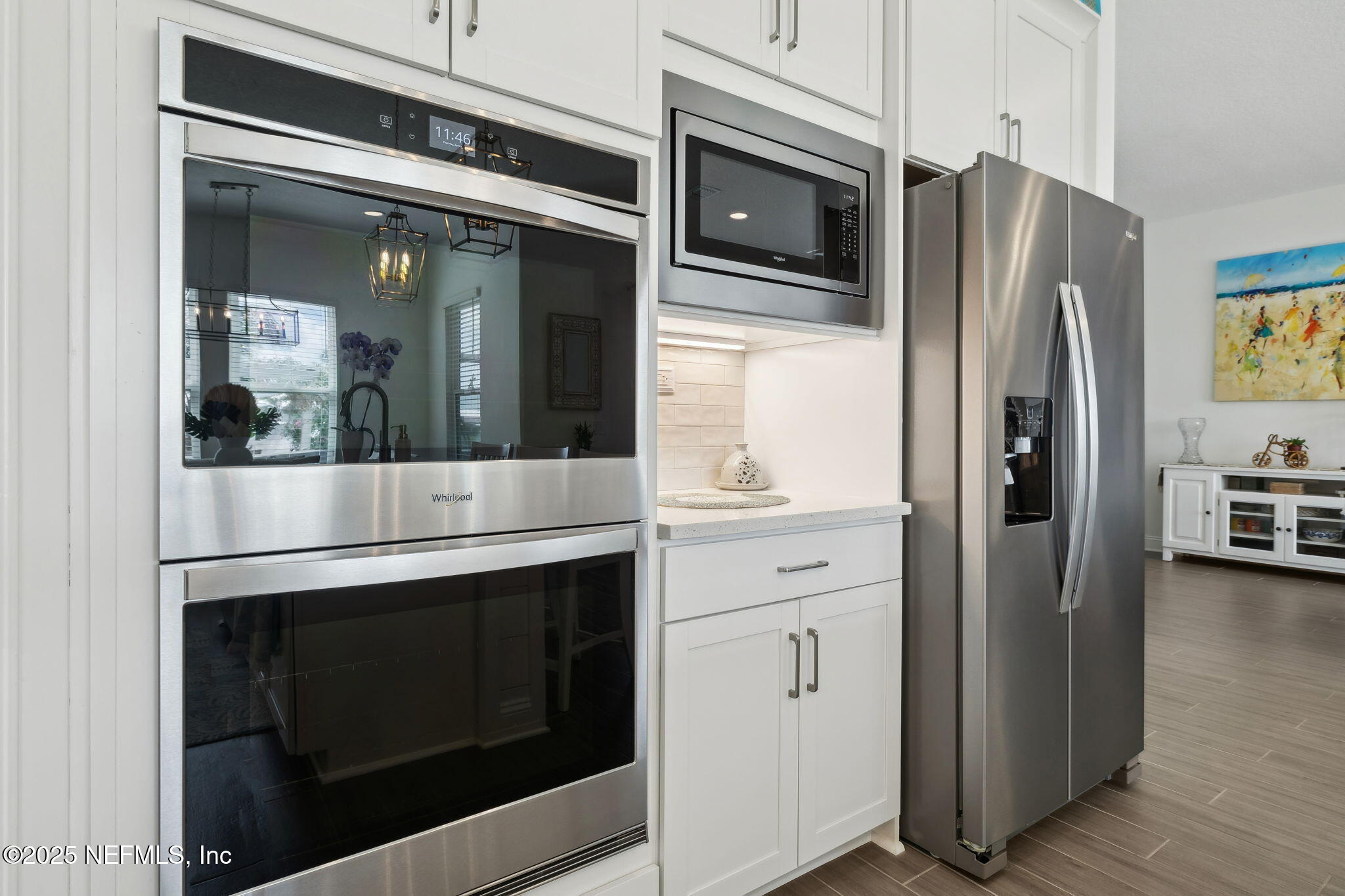 560 Rum Runner Way St. Johns, FL 32259 - Photo 16 of 101 a kitchen with stainless steel appliances granite countertop a refrigerator and a stove