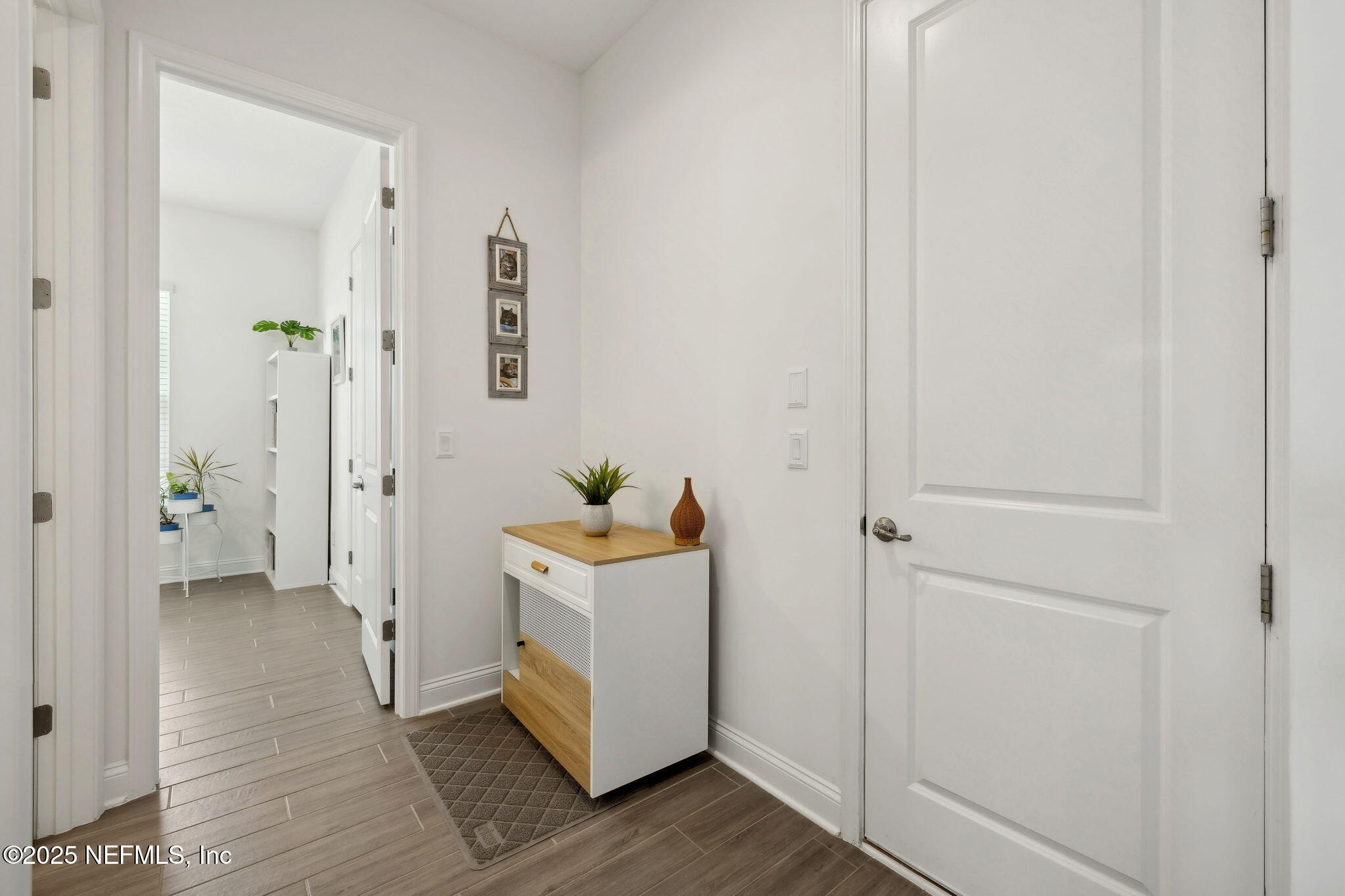 560 Rum Runner Way St. Johns, FL 32259 - Photo 31 of 101 a view of a hallway with bathroom and wooden floor