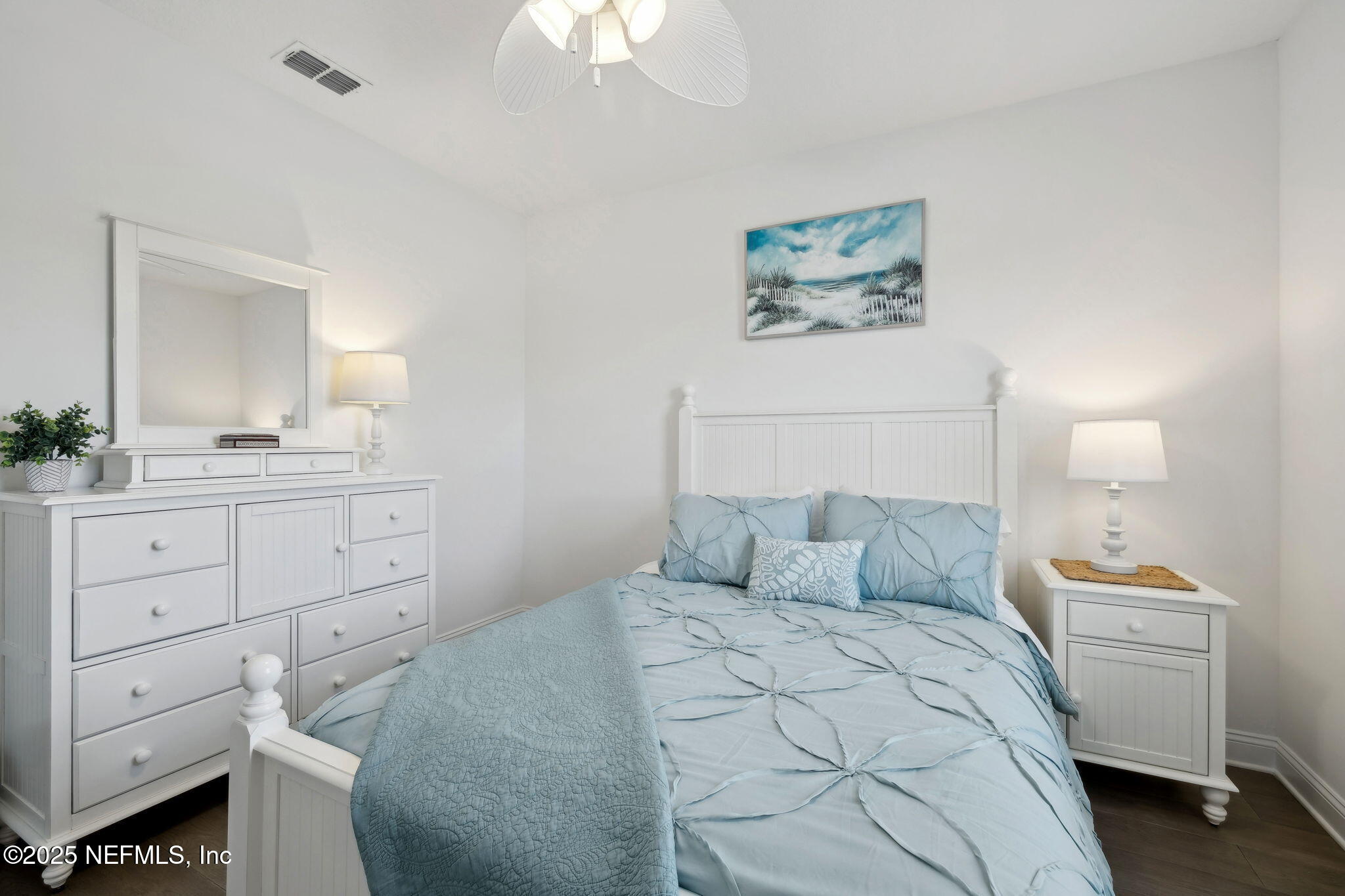 560 Rum Runner Way St. Johns, FL 32259 - Photo 35 of 101 a bedroom with a bed and a chandelier