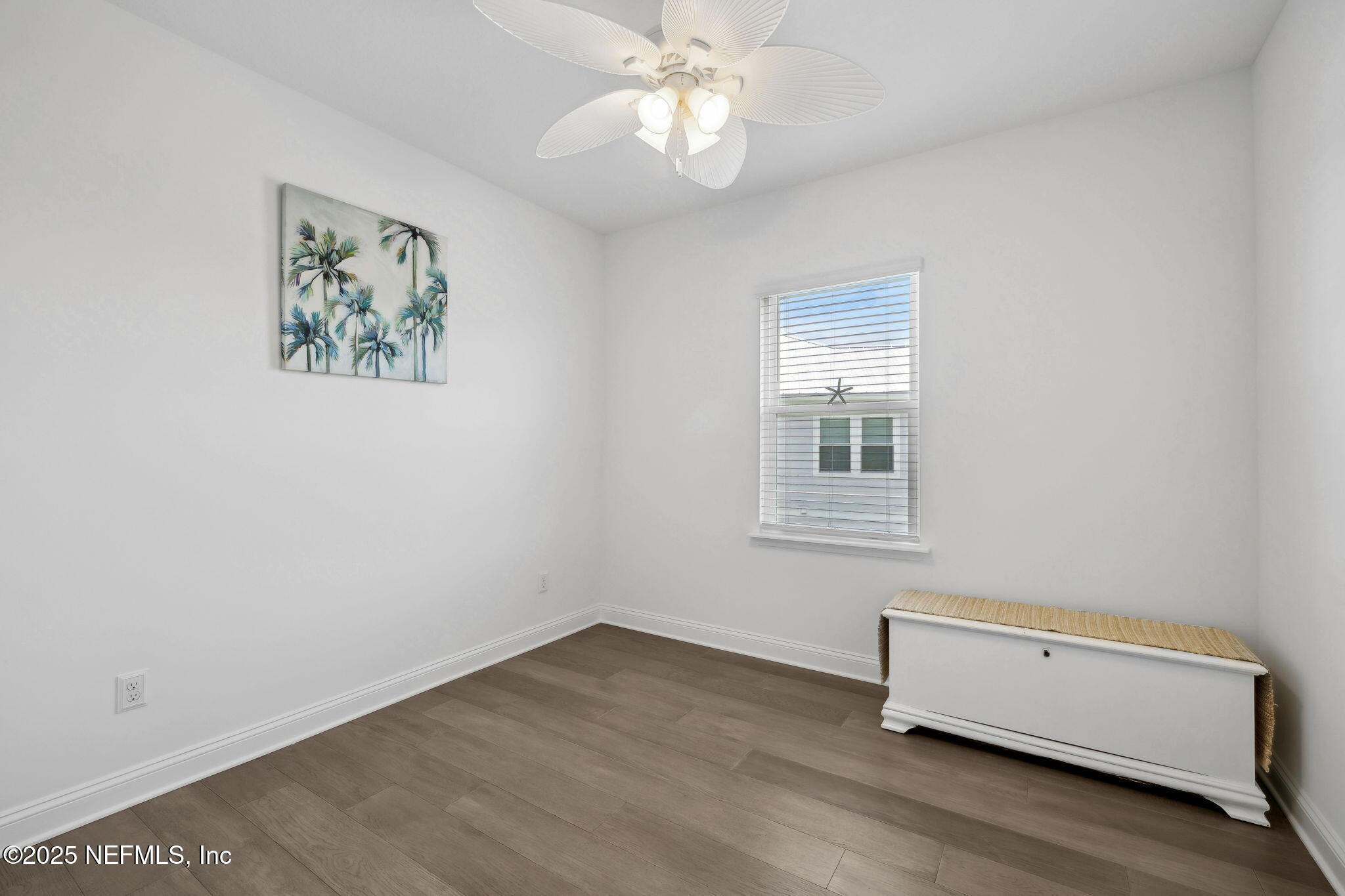 560 Rum Runner Way St. Johns, FL 32259 - Photo 37 of 101 an empty room with a window and a ceiling fan