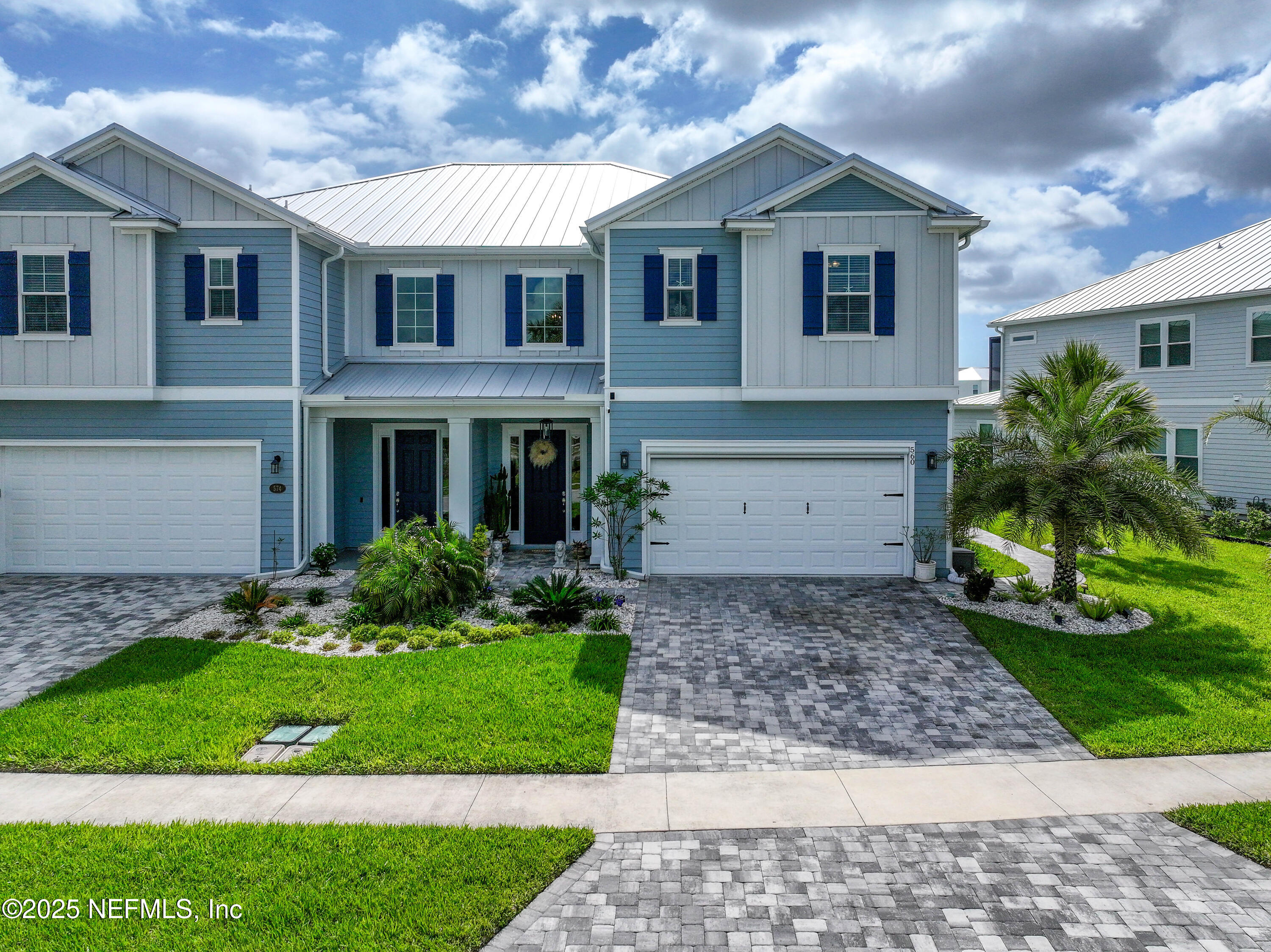 560 Rum Runner Way St. Johns, FL 32259 - Photo 61 of 101 a front view of house with yard and green space