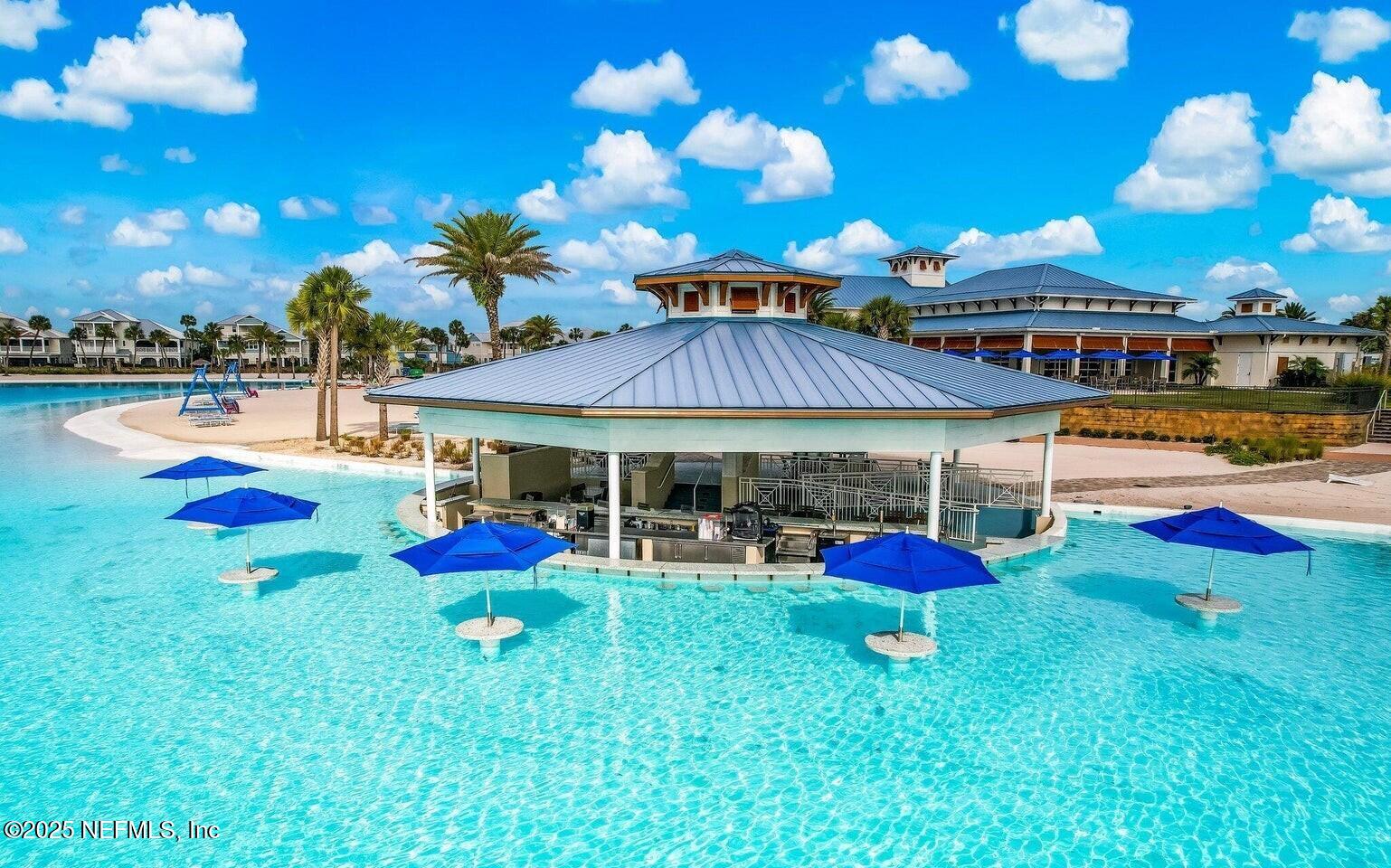 560 Rum Runner Way St. Johns, FL 32259 - Photo 86 of 101 an outdoor space with swimming pool and furniture