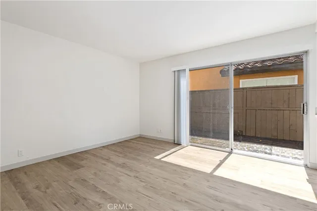 a kitchen with stainless steel appliances a refrigerator a stove a microwave and cabinets