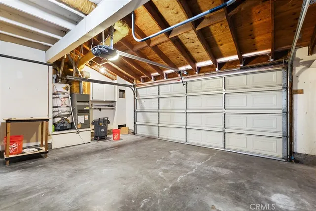 a front view of a house with a large window