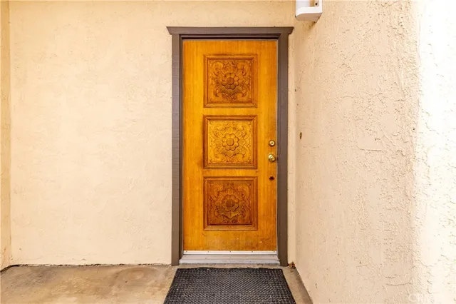 a view of a hallway with closet area