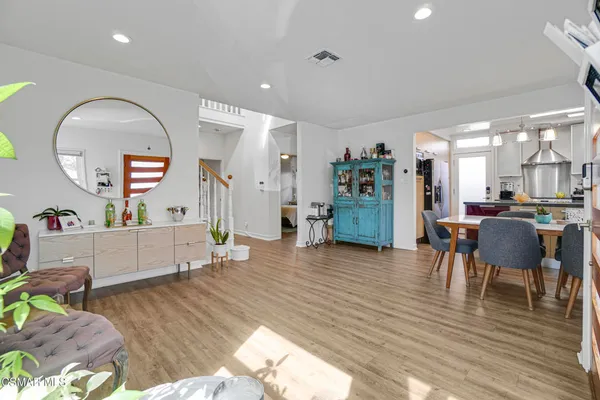 a view of a living room and dining room
