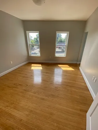 a view of an empty room and window
