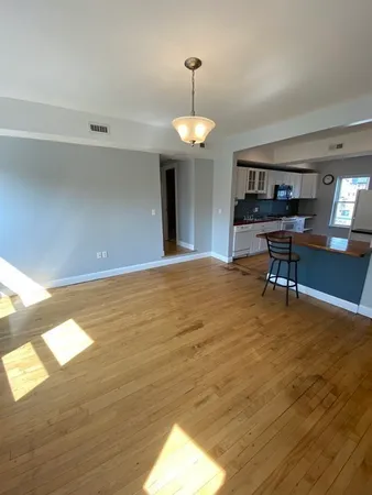a view of a livingroom with a furniture