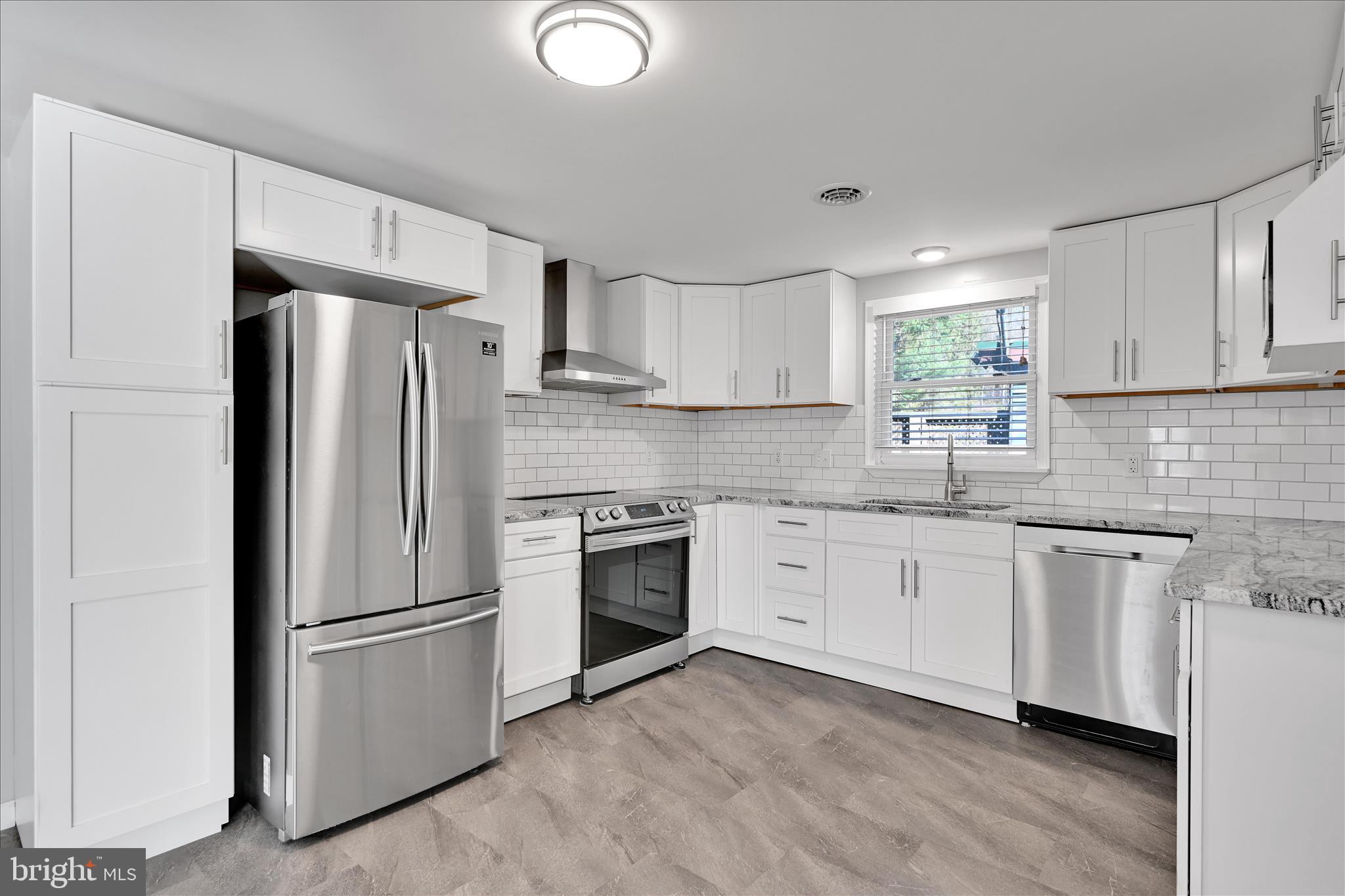 225 Owl Creek Road Tamaqua, PA 18252 - Photo 17 of 46 a kitchen with stainless steel appliances granite countertop a refrigerator sink and microwave
