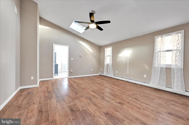 a view of an empty room and window