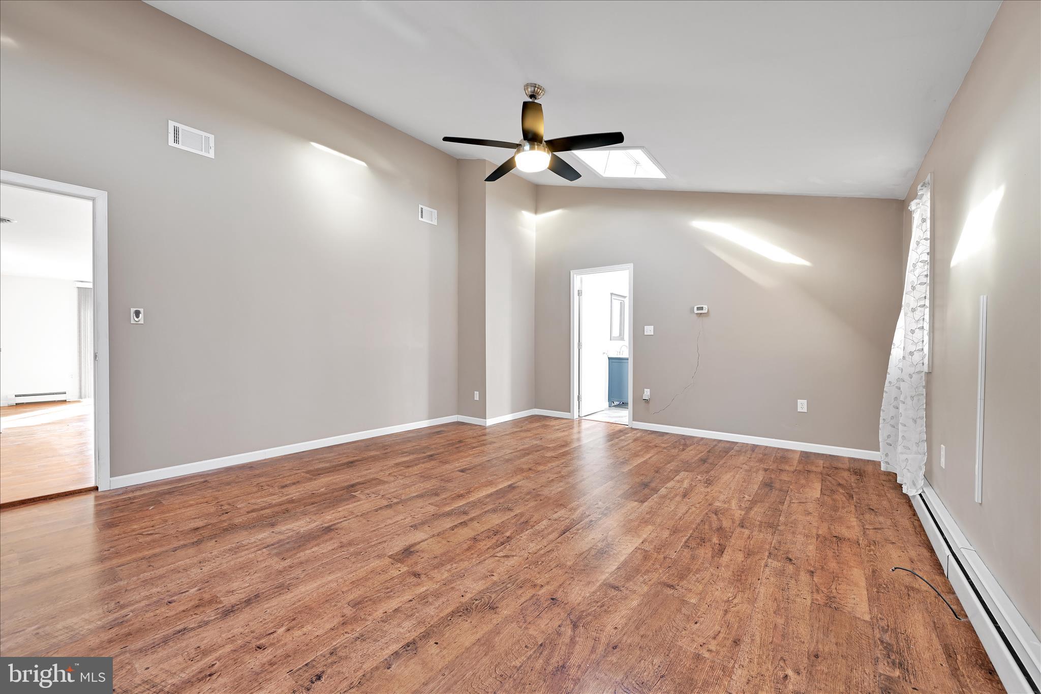 225 Owl Creek Road Tamaqua, PA 18252 - Photo 23 of 46 a view of empty room with wooden floor