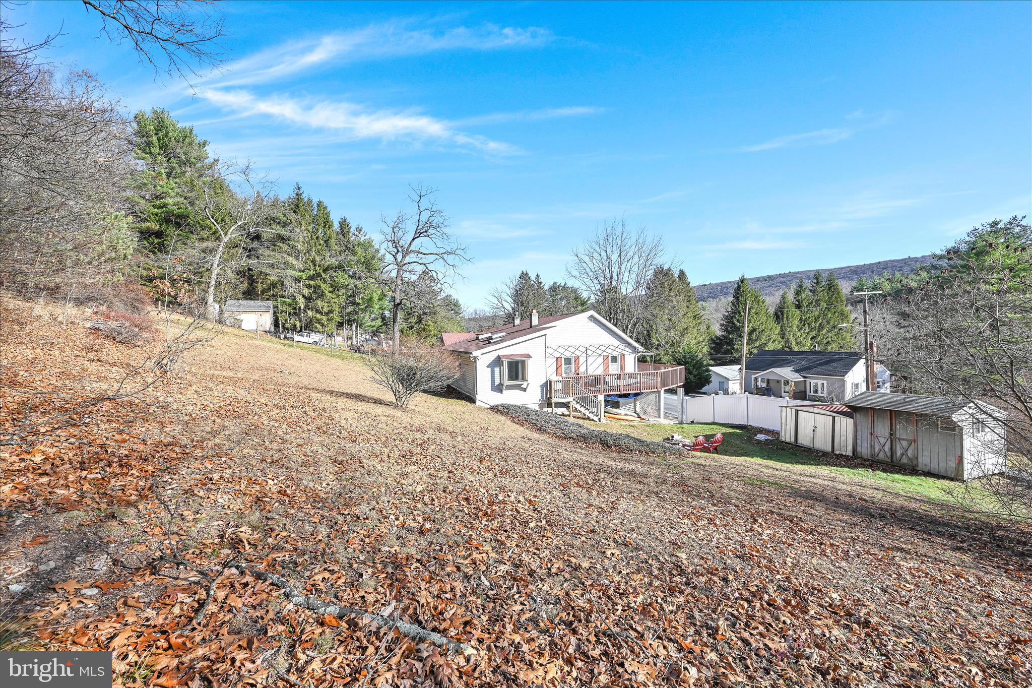 225 Owl Creek Road Tamaqua, PA 18252 - Photo 37 of 46 a view of a house with a yard and sitting area