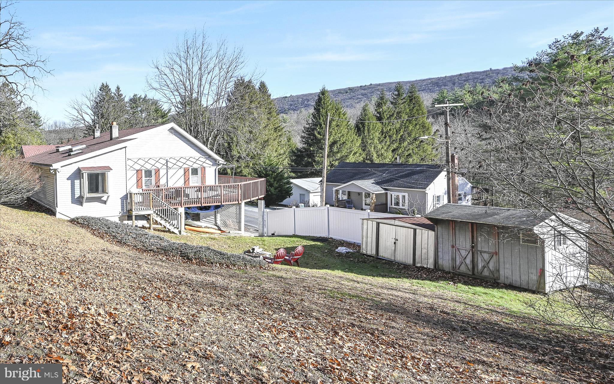 225 Owl Creek Road Tamaqua, PA 18252 - Photo 38 of 46 a view of a house with a yard