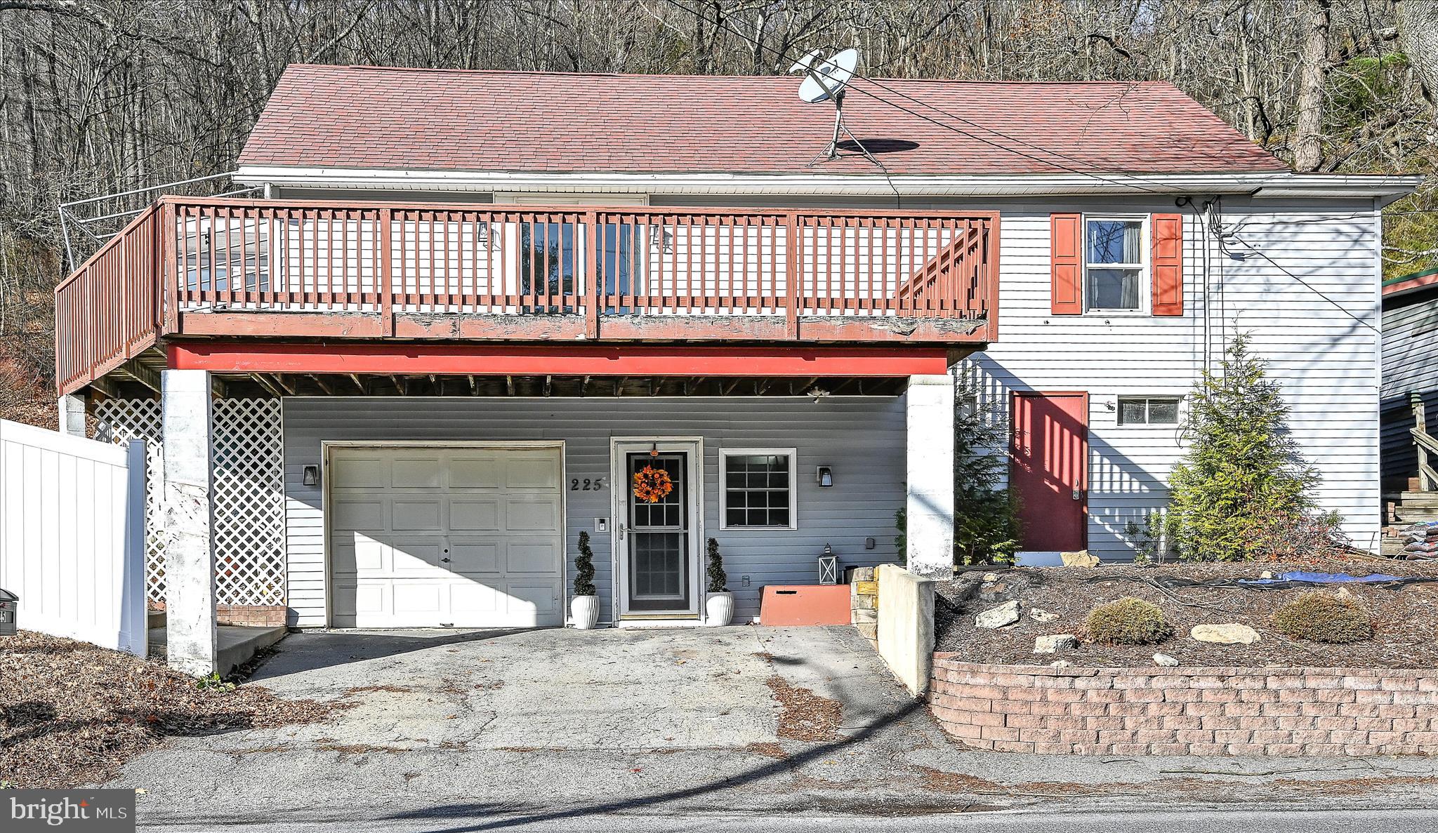 225 Owl Creek Road Tamaqua, PA 18252 - Photo 4 of 46 a view of a house with a patio