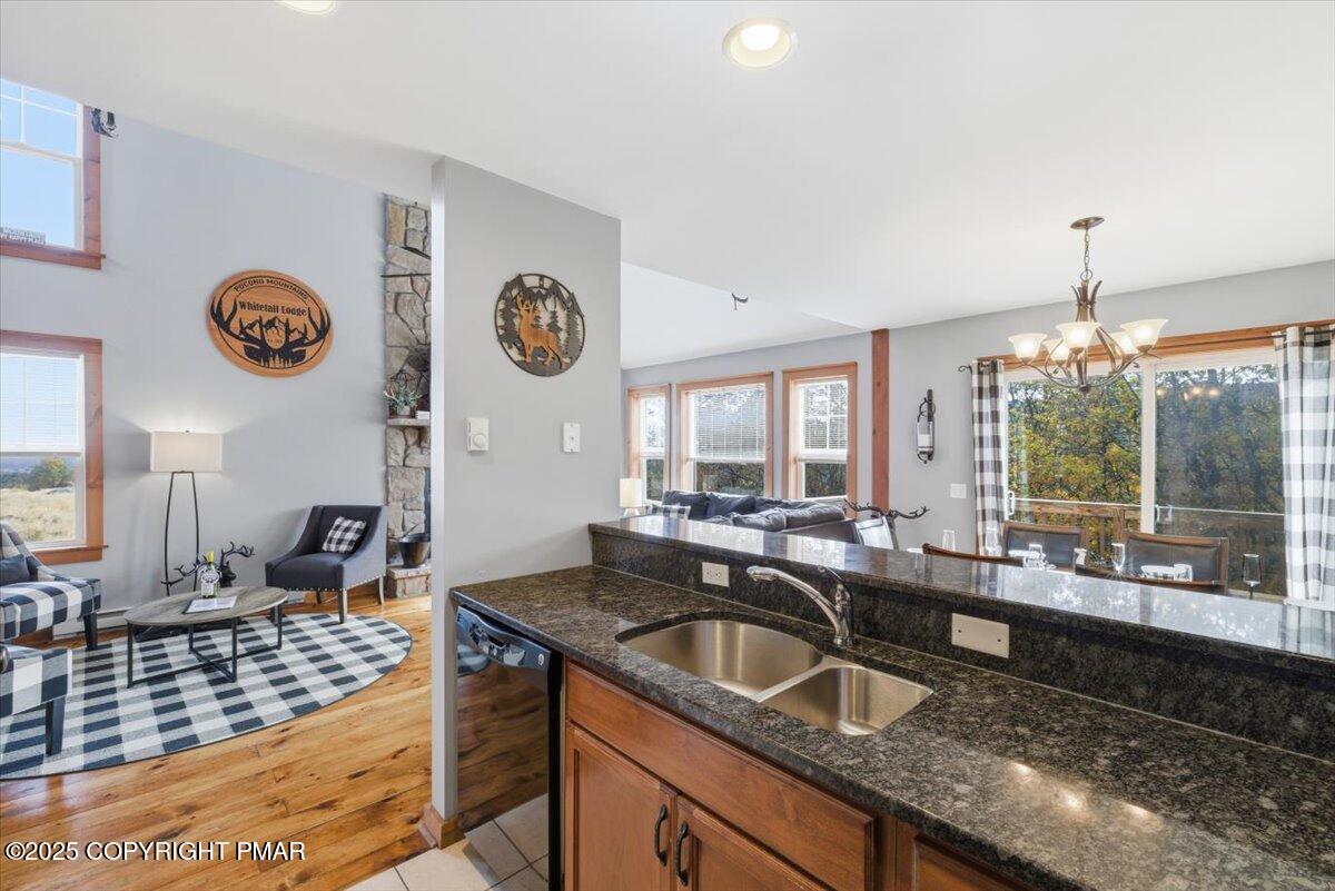 557 Upper Deer Valley Road Tannersville, PA 18372 - Photo 14 of 47 a kitchen with a sink and a large window