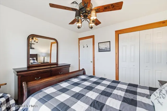 a bathroom with a sink a toilet a shower and a mirror