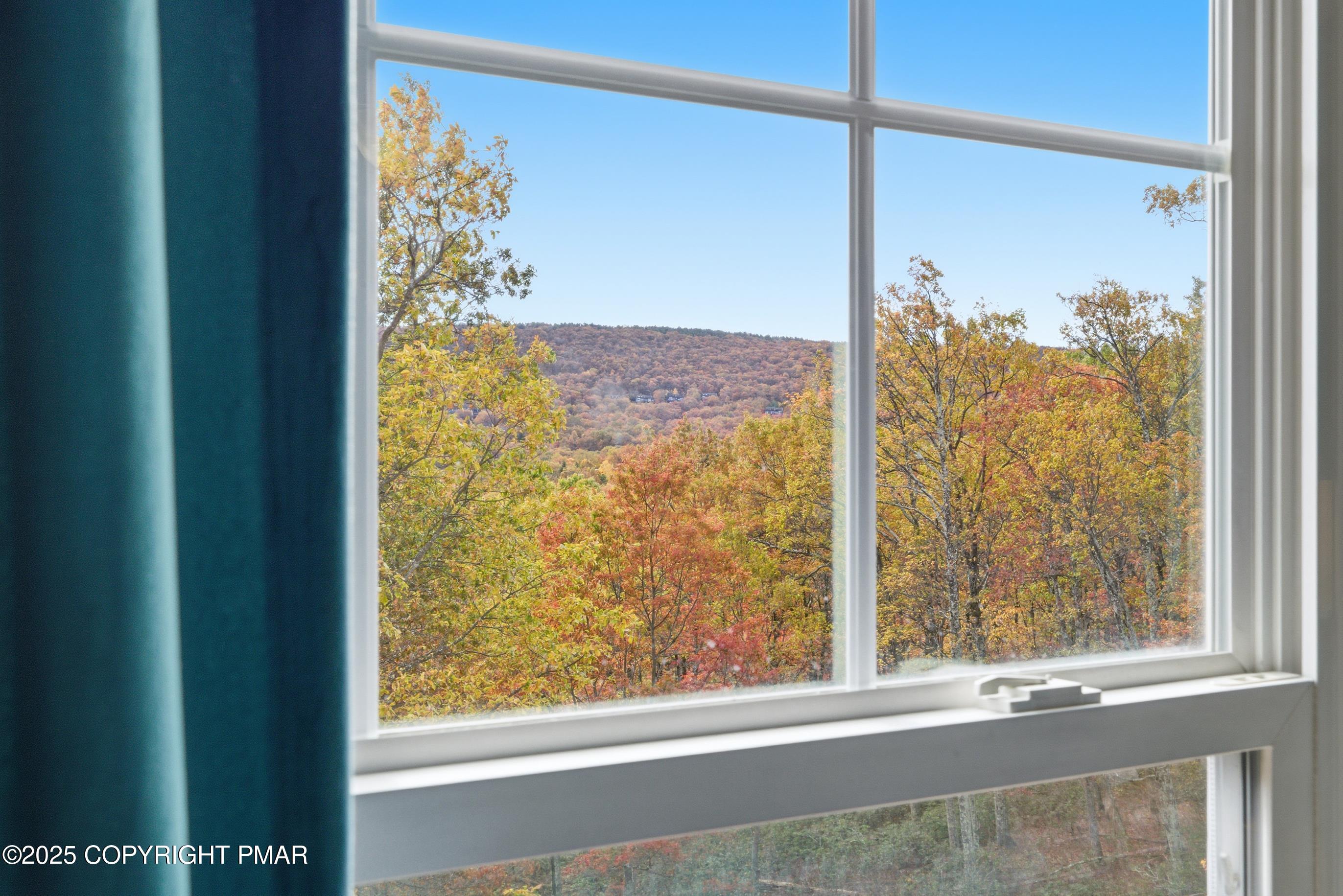 557 Upper Deer Valley Road Tannersville, PA 18372 - Photo 27 of 47 a view of a glass door and a window