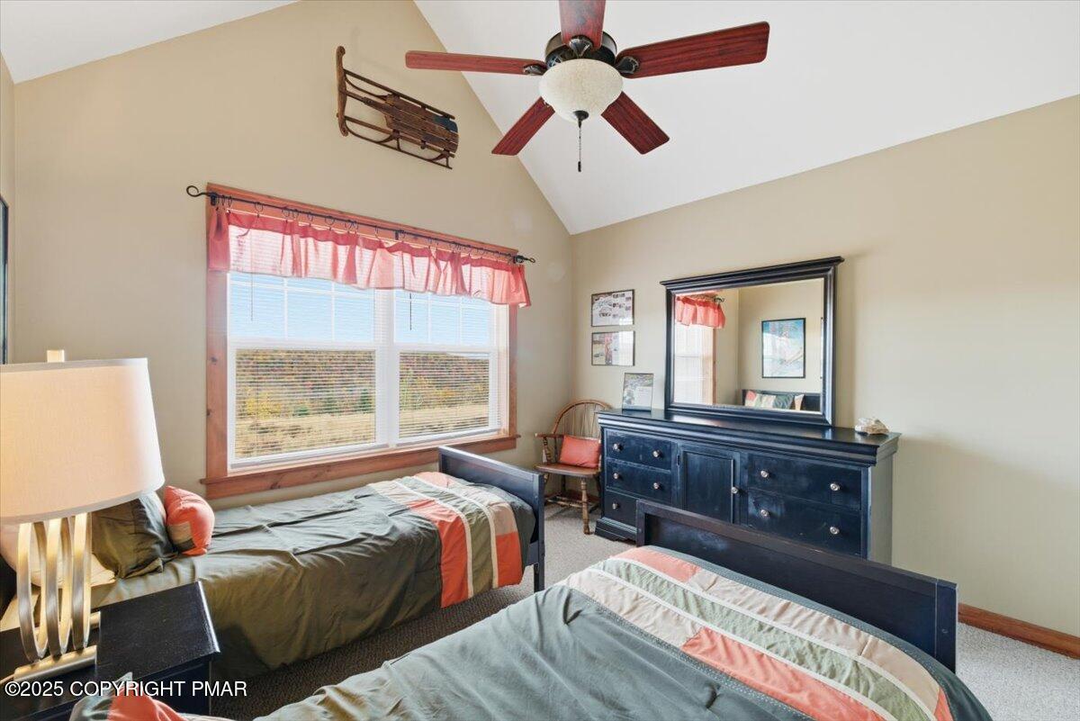 557 Upper Deer Valley Road Tannersville, PA 18372 - Photo 30 of 47 a bed room with a bed and a mirror