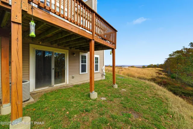 an aerial view of residential house and ocean