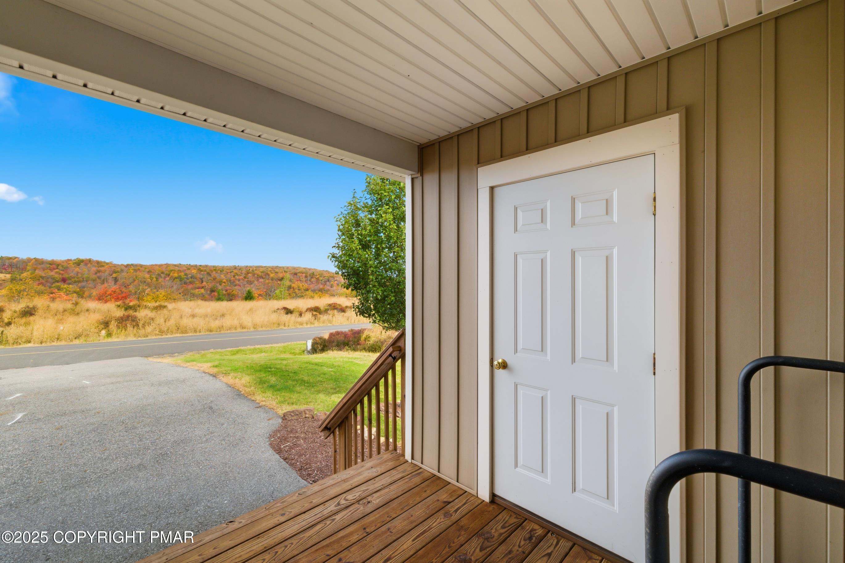 557 Upper Deer Valley Road Tannersville, PA 18372 - Photo 5 of 47 a view of a balcony with an ocean view