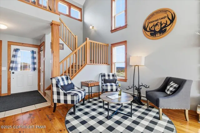 a lamp on a table and a rug