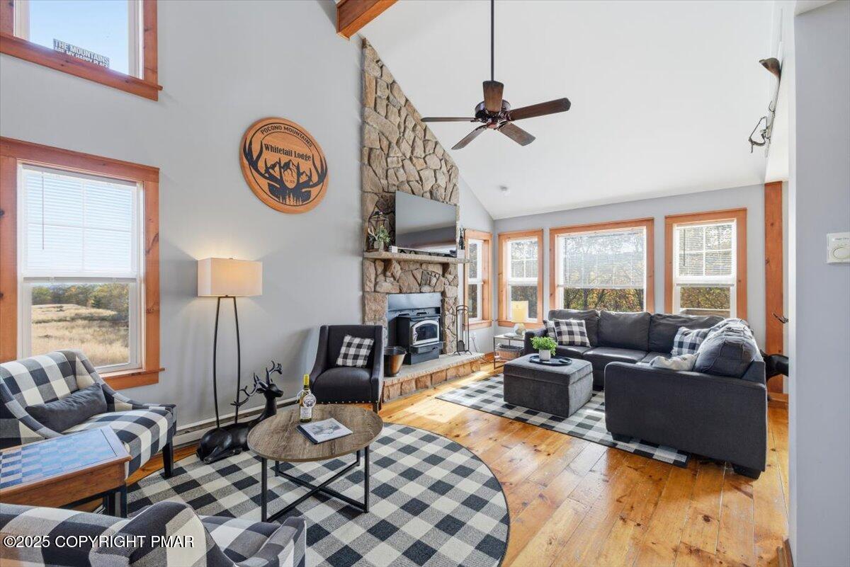 557 Upper Deer Valley Road Tannersville, PA 18372 - Photo 10 of 47 a living room with furniture and a window